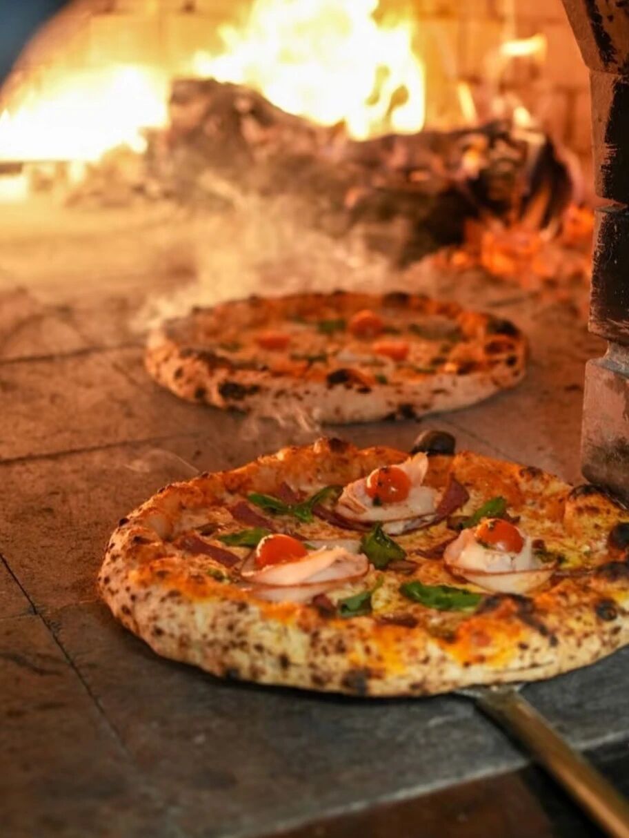 pizza in the traditional oven at Mo Farm.jpg