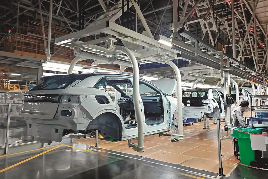 Workers assemble ID models at SAIC Volkswagen