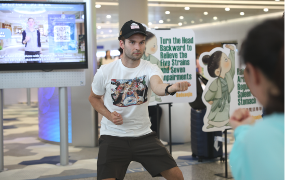 Kai Hofmaenner from Switzerland, the millionth visitor served by International Services Shanghai