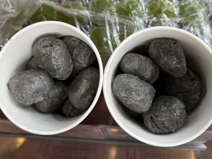 The little coal briquette pork mooncake.jpg