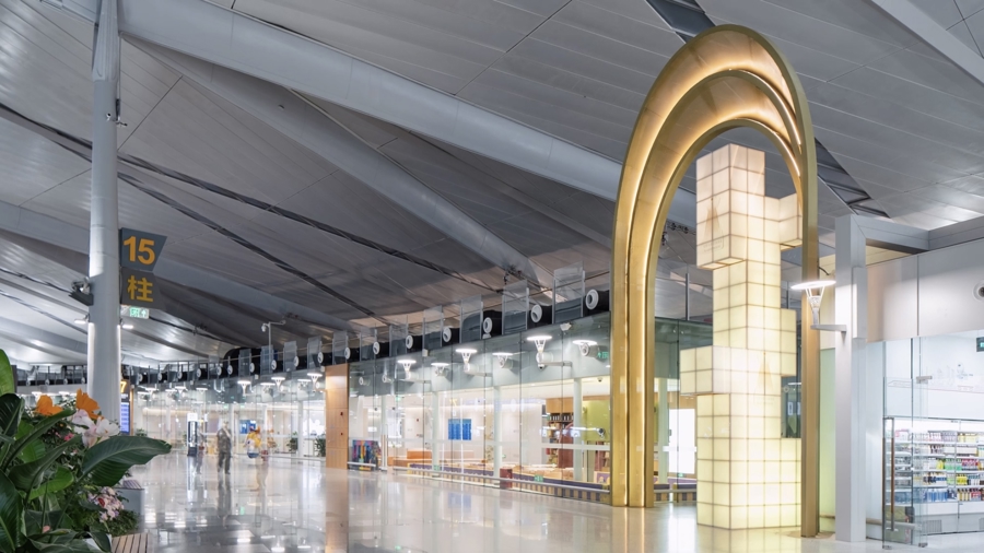 The library entrance features a golden archway.jpg