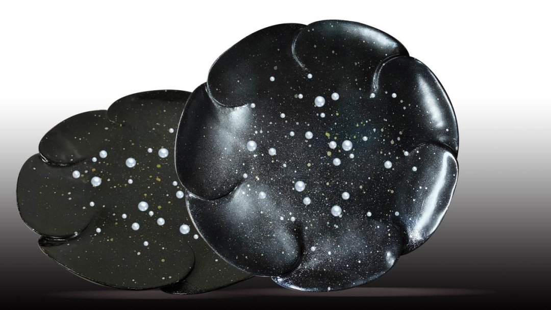 This piece from China uses lacquer art to create a cosmic starry sky on wooden objects.png