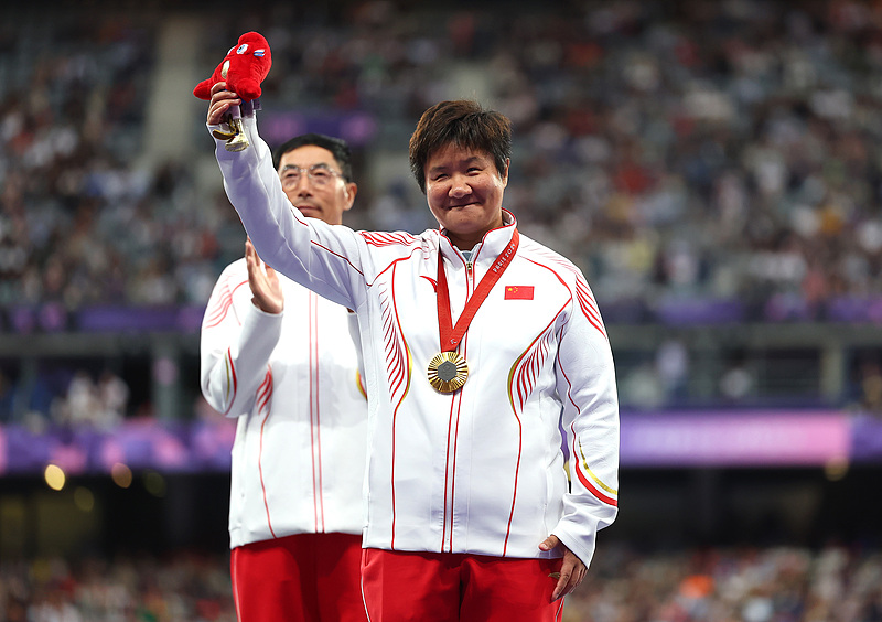 Six-time Paralympian defends discus throw title