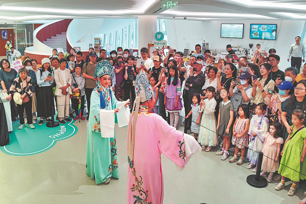 Visitors gather at the lobby of the Wanping Theater in Xuhui district.jpeg