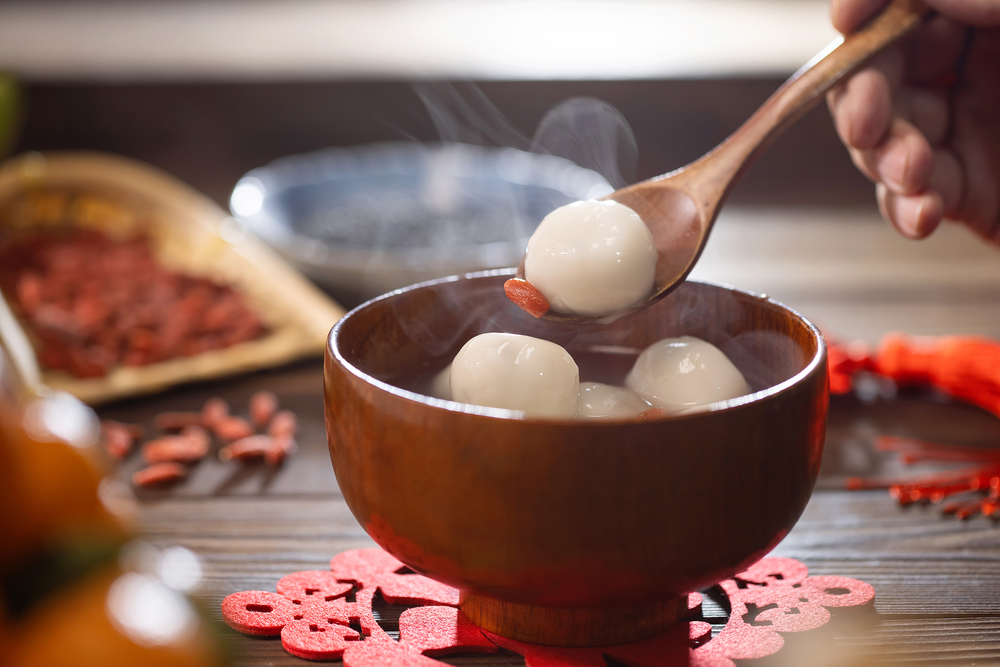 Hot and soft glutinous rice balls are an essential treat for the festival.jpg