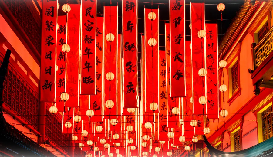 A series of couplets, created in collaboration with Shanghai Lexicographical Publishing House, stands in harmony with the radiant lanterns all around..jpg
