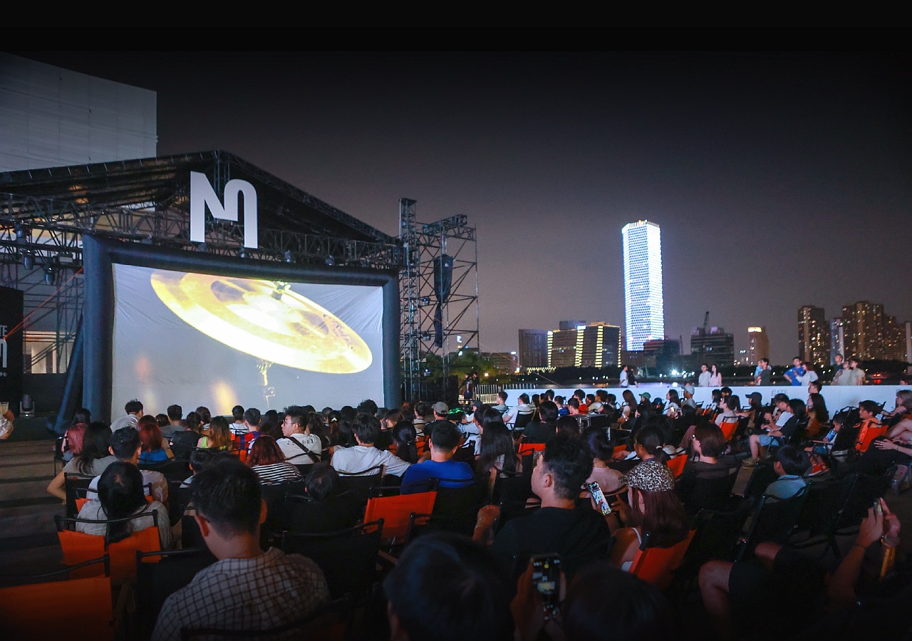 Visitors can enjoy movies screened in the open air at the festival.jpg
