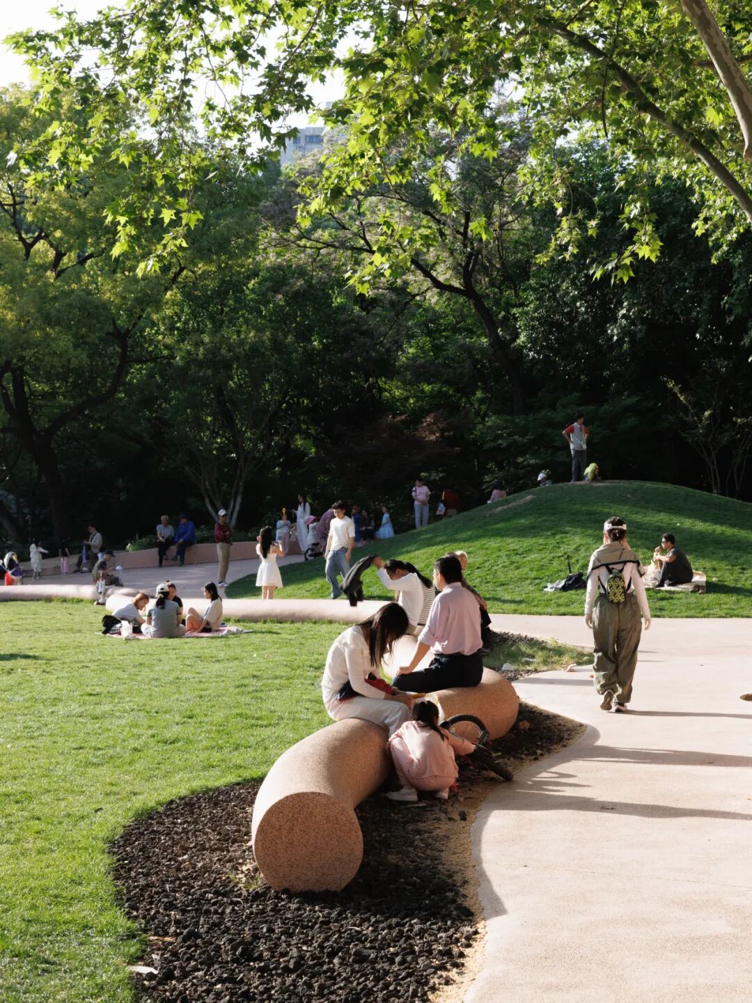 A curved bench beside the lawn.jpg
