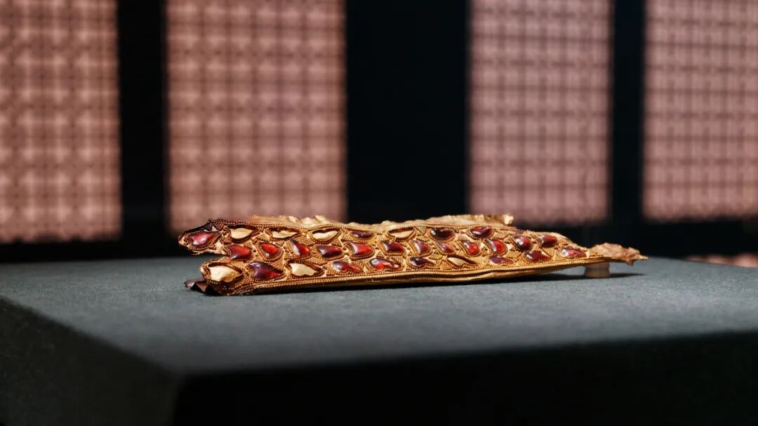 A gold sword sheath inlaid with rubies, dating to the fifth and sixth centuries..jpg