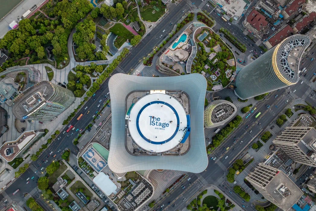 Soar above Shanghai's skyline from 320 meters up