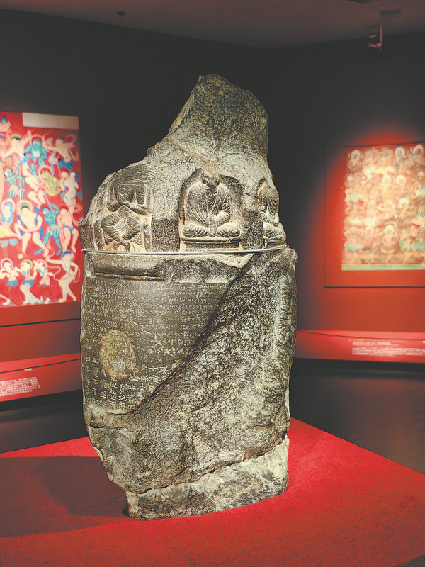 A stone stupa, with inscriptions of the Buddhist sutra in Chinese and ancient Indian writing, built in the Northern Liang period (397-460). GAO ERQIANG CHINA DAILY.jpeg