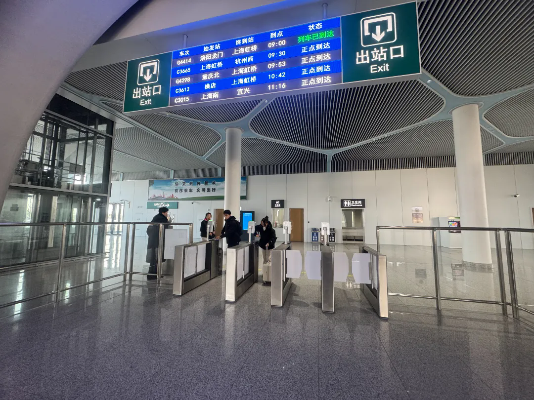 Passengers go through security at Liantang Railway Station in Qingpu district, Shanghai. .jpg