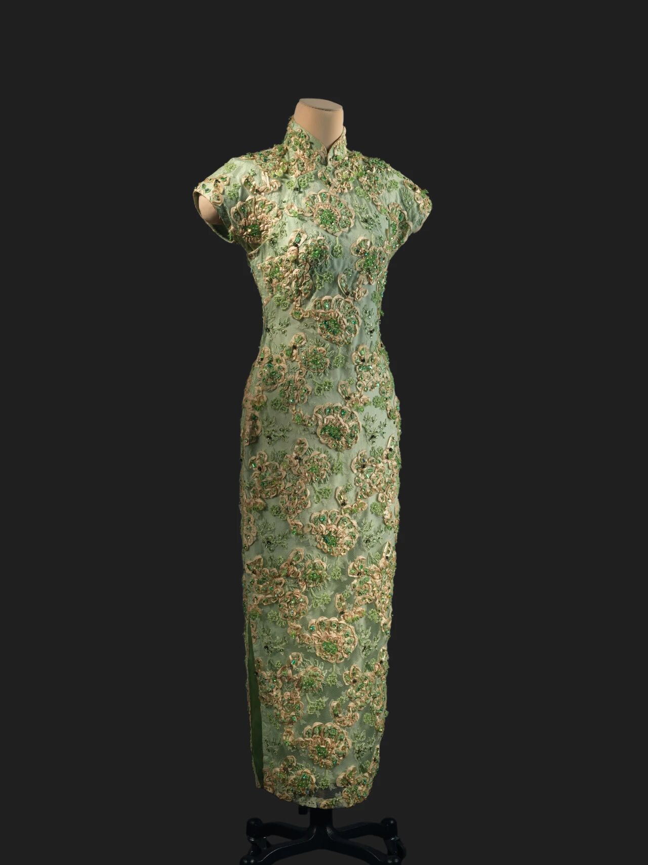 A light green embroidered floral mesh qipao from the 1940s-1950s, donated by Patricia Pei.jpg