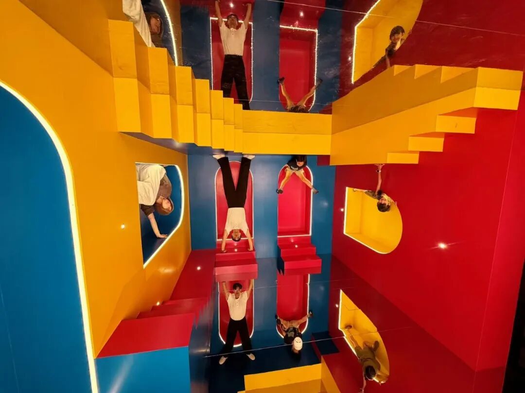 Visitors engage with an optical illusion installation at the museum1.jpg