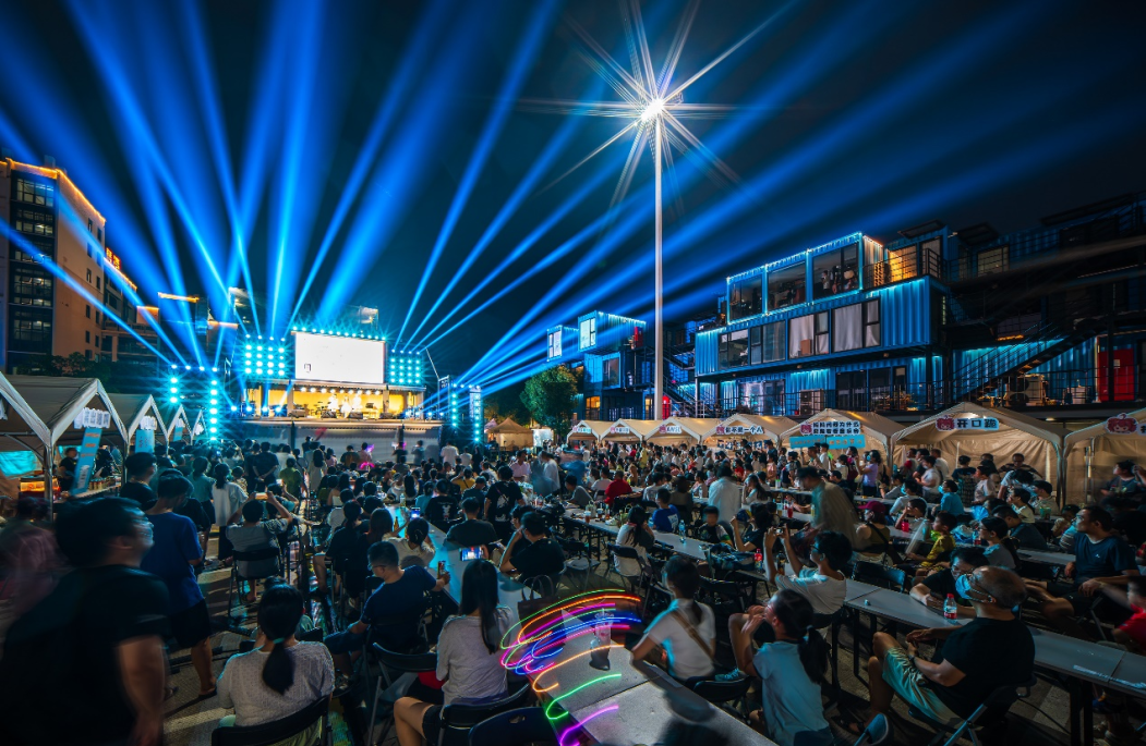 The audience delights in the music at the festival..png