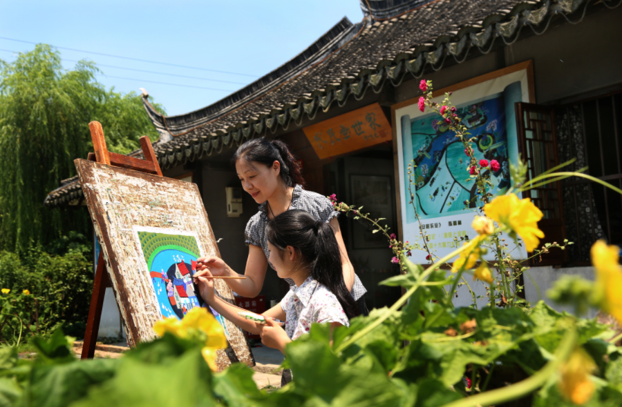 Families can enjoy the experience of creating folk art paintings together..png