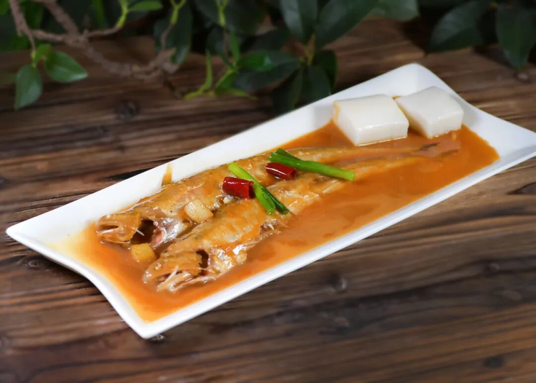 Soy-braised tapertail anchovy with rice cakes.jpg